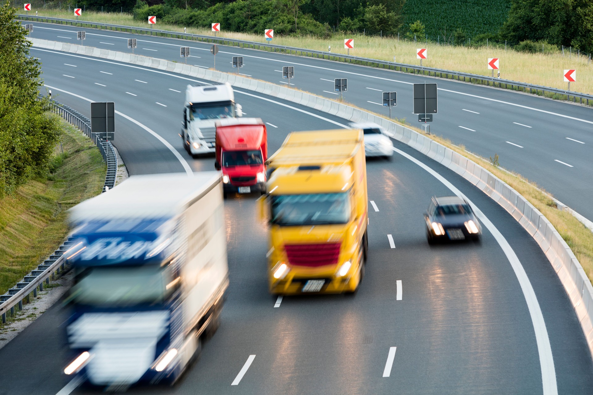 Trucks Speeding on Highway, Heavy Goods Transportation, Aerial View