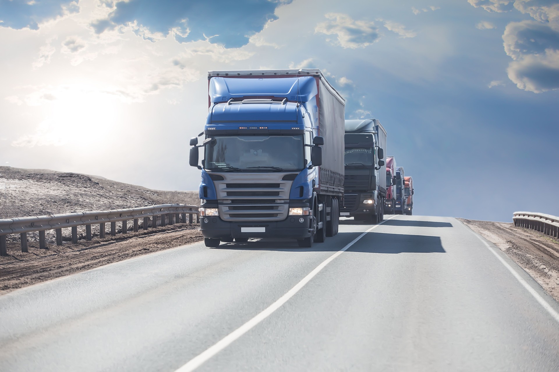 Trucks Moving along the Highway