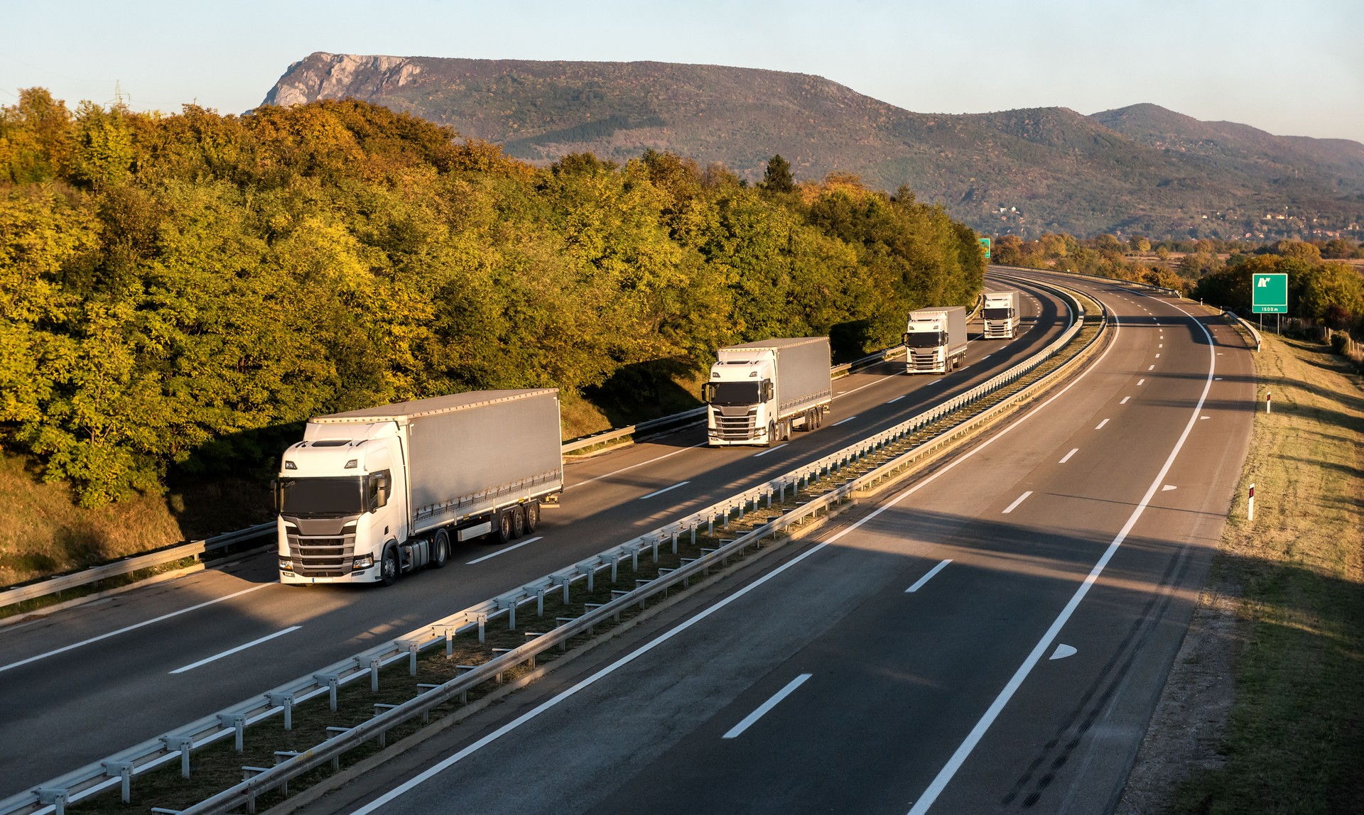 Transit photo - Convoy of transportation trucks